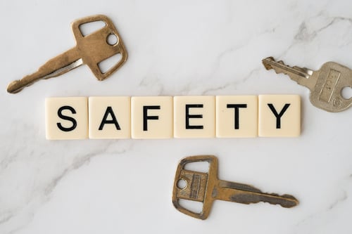 Safety written in scrabble letters with three keys around it
