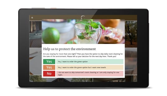 Green Option notification screen on hotel room tablet