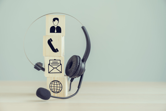 VOIP headset and Icon communication on the wood block