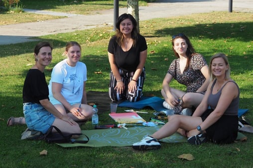 Content and Marketing team painting their canvases 