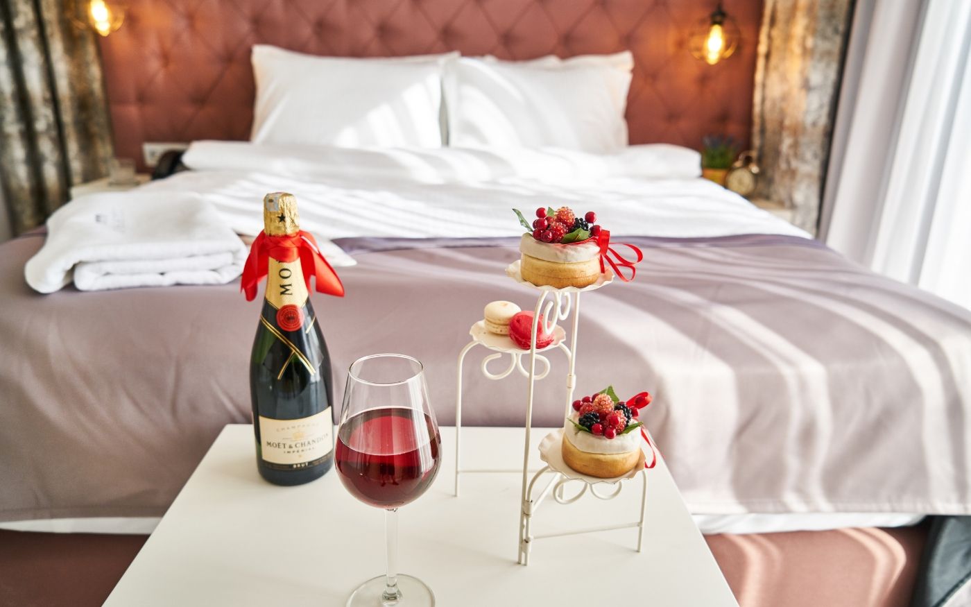 Wine and glasses in a hotel room