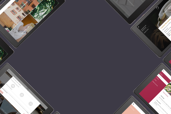 suitepad tablets on a grey background